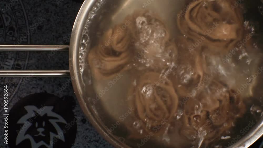Cooking pasta trenette in a saucepan. Video Cooking pasta trenette in a saucepan. Video