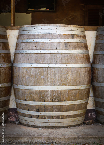 Wine barrels in the cellar of the winery