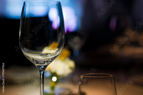 Empty glasses wine in restaurant. Glass water.dish spoon fork on table at restaurant