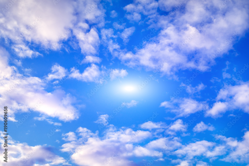 Fototapeta premium texture of the sky clouds and rays of sun on a background