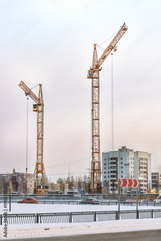 two cranes at construction site