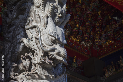 Chinese religion, important pillar in front of the temple, dragon pillar carving © wu shoung