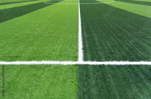 New soccer field with green artificial grass