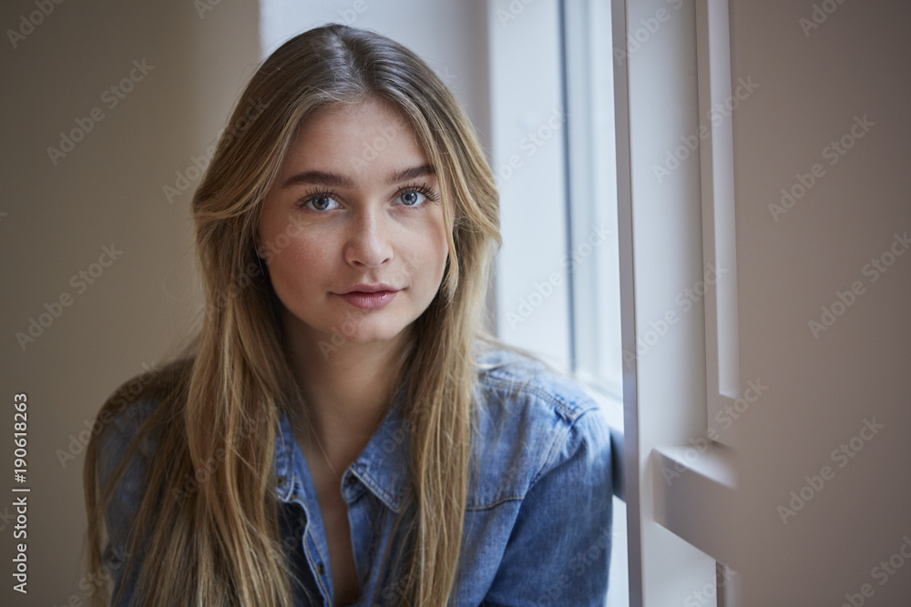 Portrait of young girl in blue denim shirt Portrait of young girl in blue denim shirt