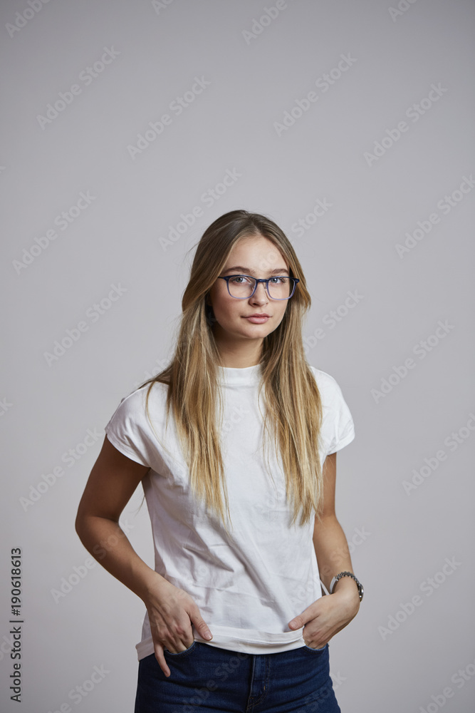 Portrait of girl in glasses and white t-shirt Portrait of girl in glasses and white t-shirt