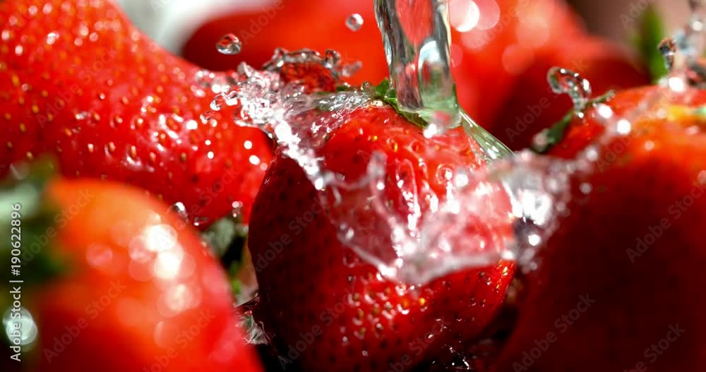 Water falling on strawberry shot in super slow motion on Phantom Flex ...