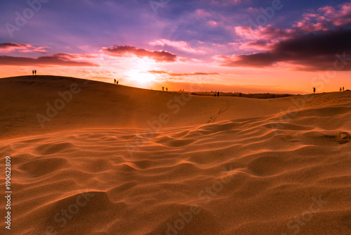 Sunset over the dunes of Maspalomas. Island of Gran Canaria