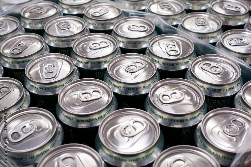 Cover alumiunum cans. Aluminum cans. Top view. Aluminum cans in the market Cover alumiunum cans. Aluminum cans. Top view. Aluminum cans in the market