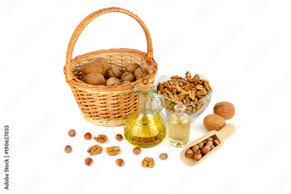 Oil of walnut and hazelnut, nuts fruit isolated on white background.