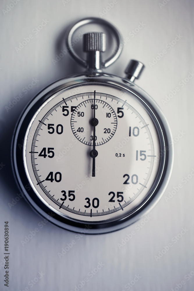 Old stopwatch isolated on white background top view Old stopwatch isolated on white background top view