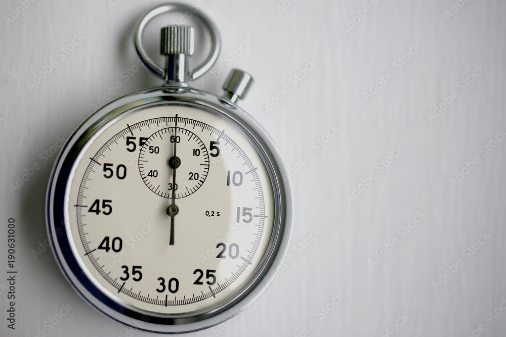 Old stopwatch isolated on white background top view Old stopwatch isolated on white background top view