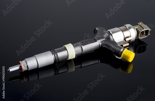 Diesel fuel injector isolated on black