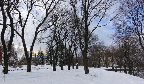 Park Vladimir's Hill in Kiev. Winter. In the distance the Mikhaylovsky Golden-domed Cathedral © Firefly