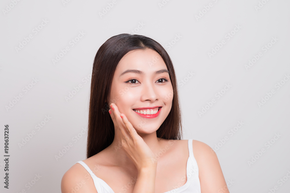 Portrait of a beautiful young woman with clean skin Portrait of a beautiful young woman with clean skin