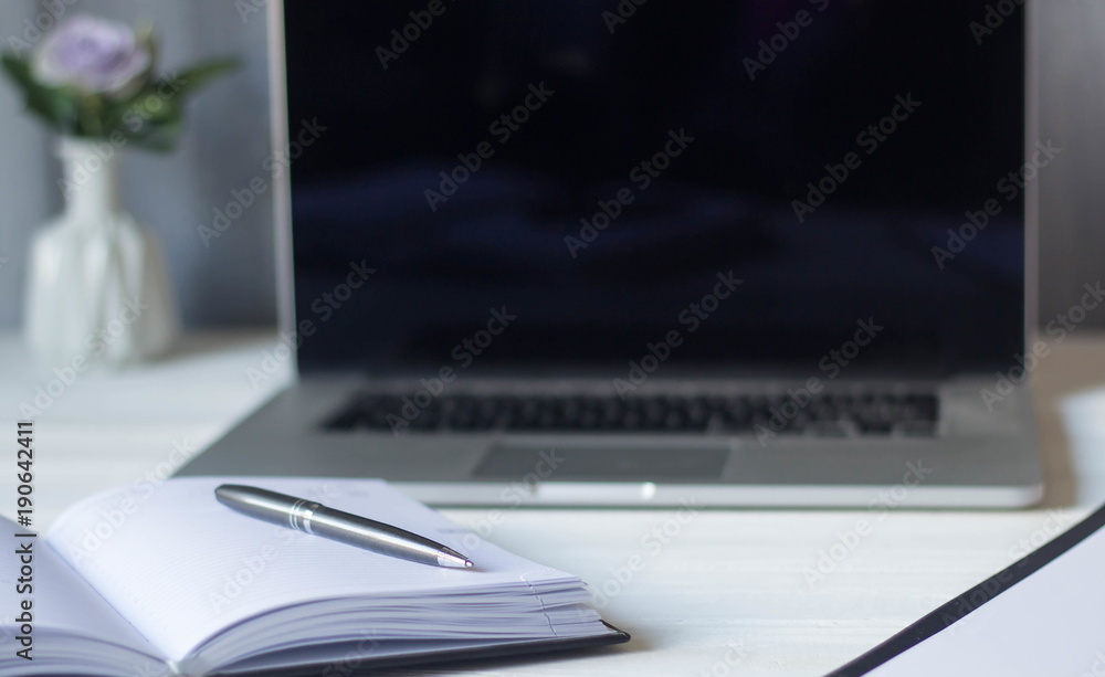 laptop and documents in the workplace. laptop and documents in the workplace.