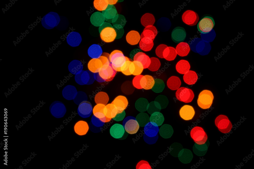luci colorate effetto bokeh su sfondo nero luci colorate effetto bokeh su sfondo nero