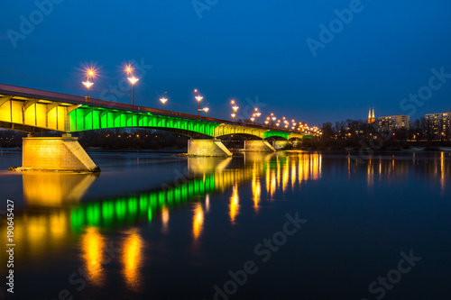 Night view on the Slasko-Dabrowski bridge over the Vistula river, Warsaw, Poland © Artur Bociarski