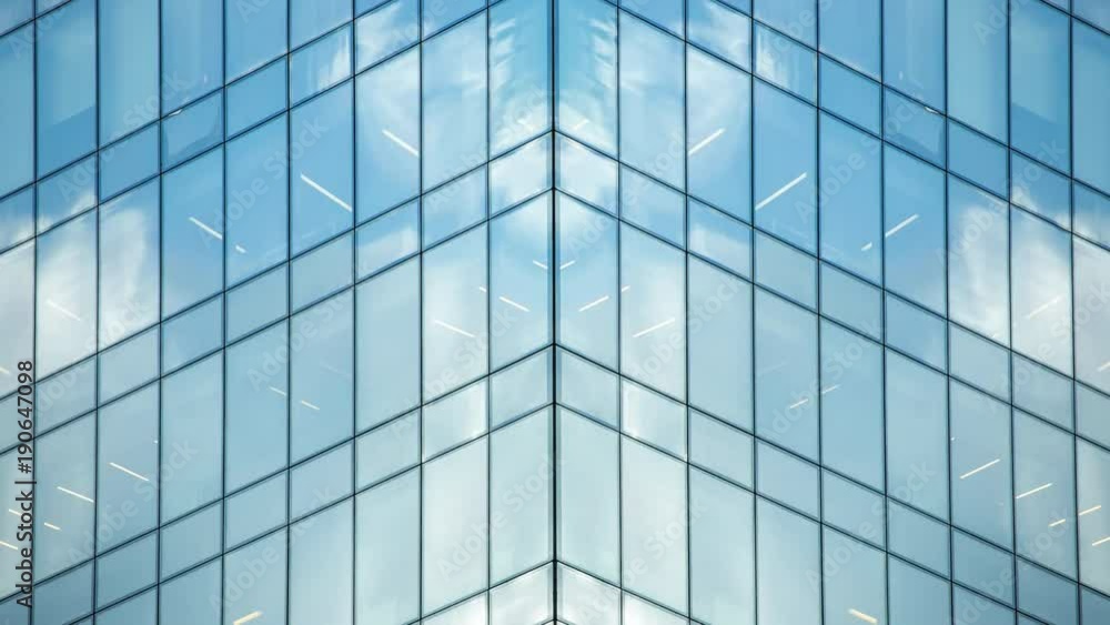 Timelapse Closeup Of Clouds Reflected In The Many Mirrors Of An Office Building Timelapse Closeup Of Clouds Reflected In The Many Mirrors Of An Office Building