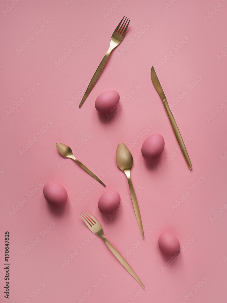 Still life photo of lots of pink easter eggs and flatware Still life photo of lots of pink easter eggs and flatware