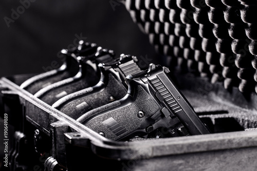 black handgun in plastic Secure Storage Case