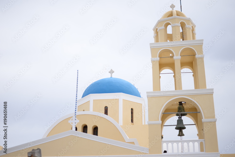 Old blue dome church in Santorini. Place for text