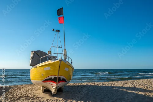 Obraz mały żółty kuter rybacki