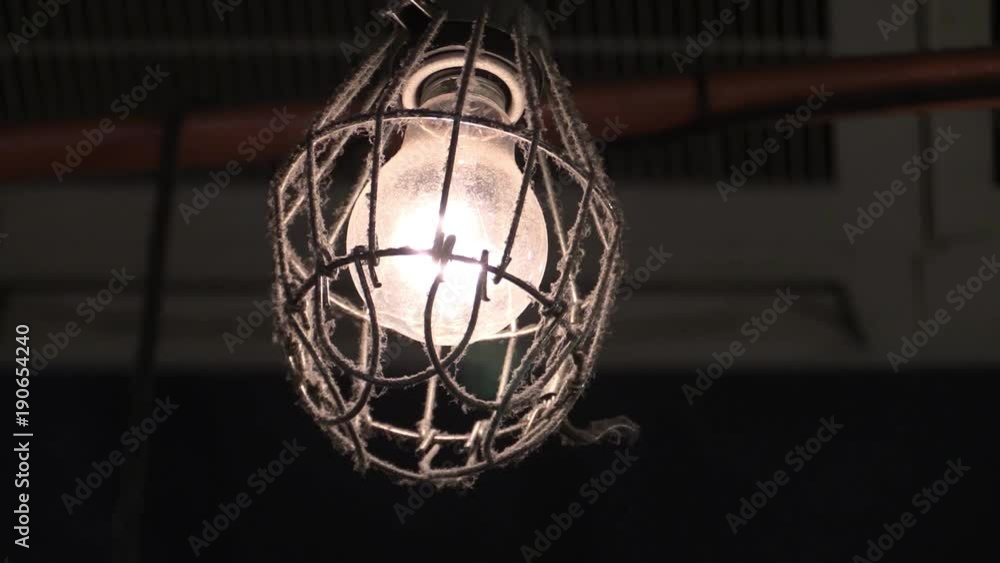 a old flash bulb hanging on the ceiling a old flash bulb hanging on the ceiling