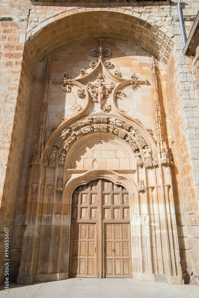 door of church of the Assumption, landmark and monument from fourteenth to sixteenth century, in Melgar de Fernamental, village in Burgos, Spain, Europe
