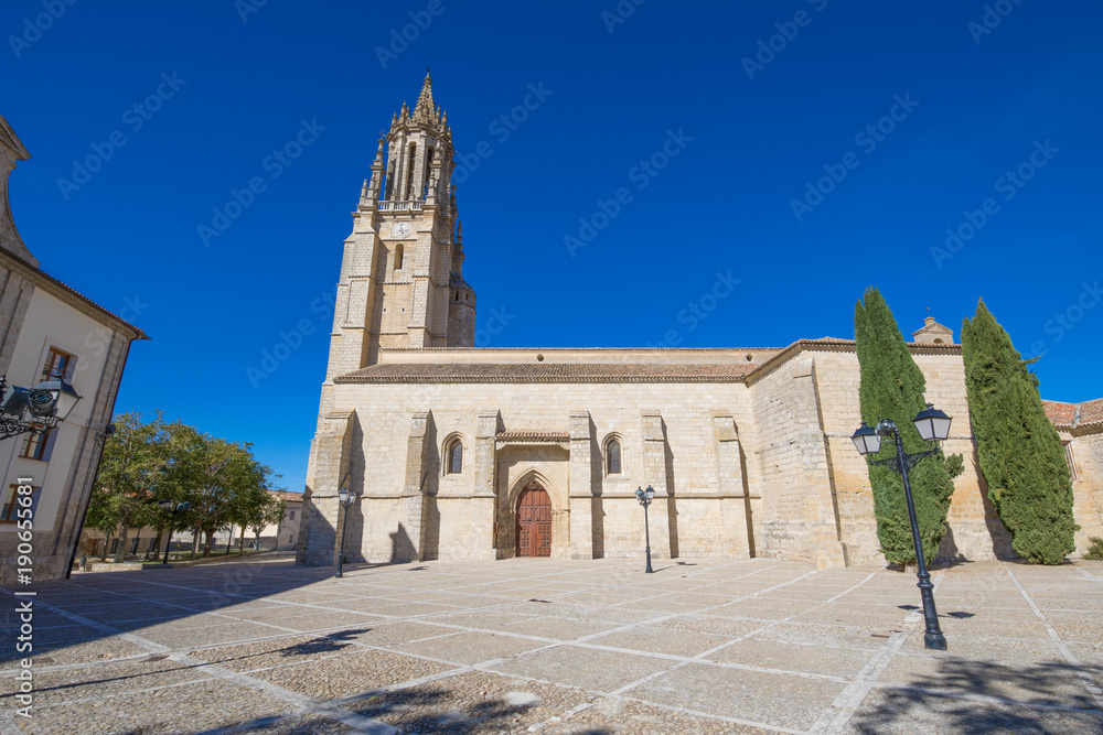 landmark facade of Collegiate of San Miguel, or Saint Michael, gothic renaissance monument from eleventh to sixteenth century, in Ampudia village, Palencia, Castile Leon, Spain, Europe
