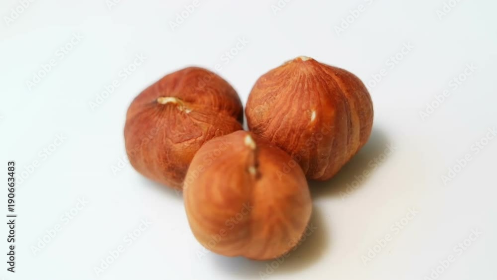 Hazelnuts close-up. Smooth rotation. Filler for walnut paste and chocolate. Hazelnuts close-up. Smooth rotation. Filler for walnut paste and chocolate.