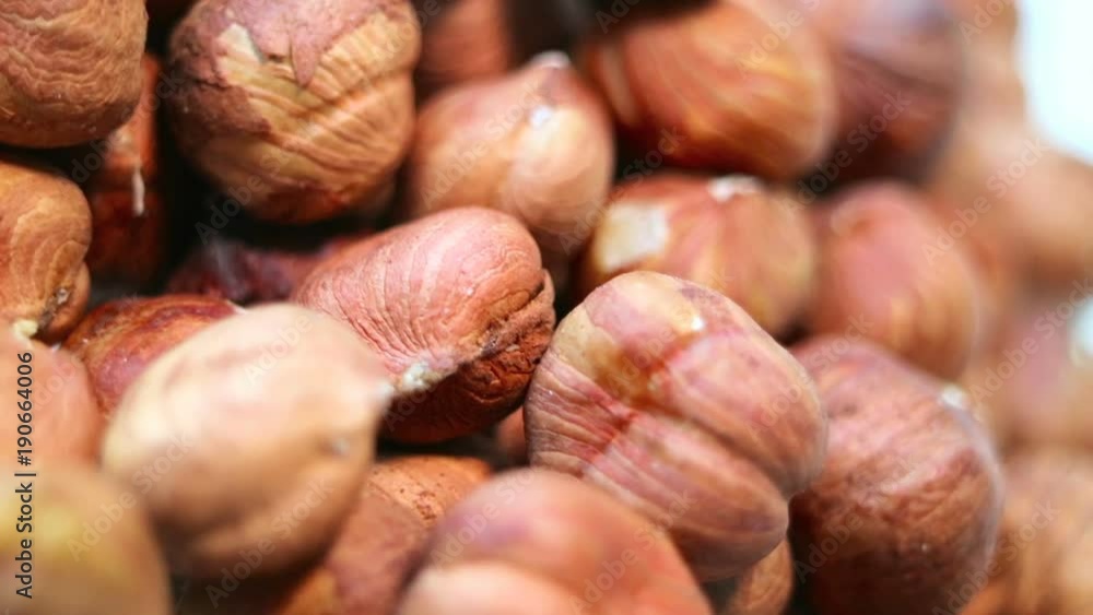Hazelnuts close-up. Smooth rotation. Filler for walnut paste and chocolate. Hazelnuts close-up. Smooth rotation. Filler for walnut paste and chocolate.