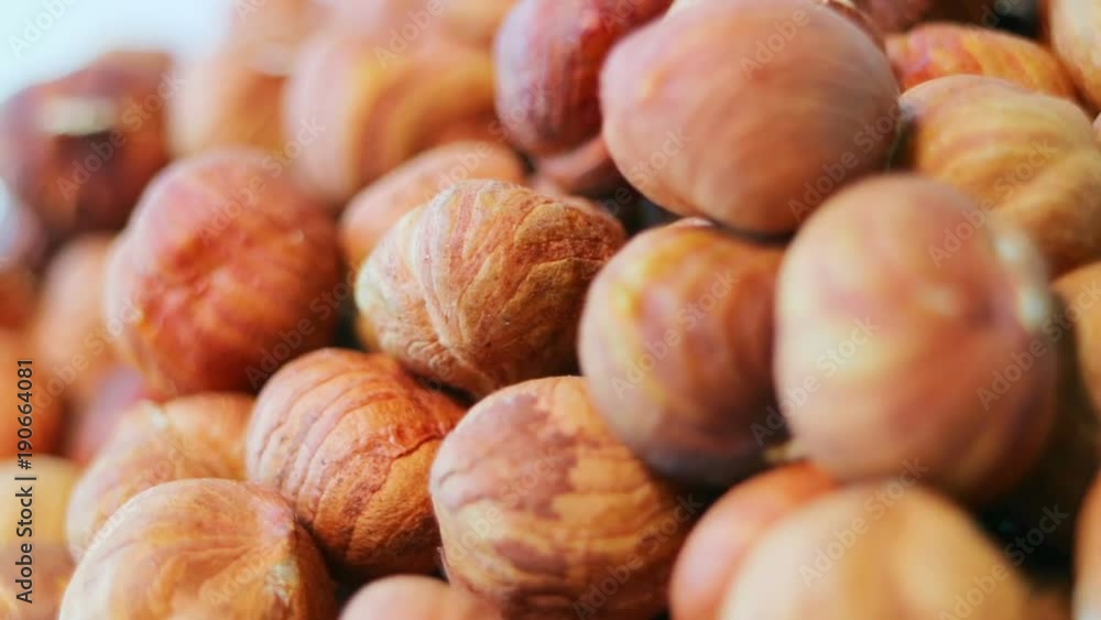Hazelnuts close-up. Smooth rotation. Filler for walnut paste and chocolate. Hazelnuts close-up. Smooth rotation. Filler for walnut paste and chocolate.