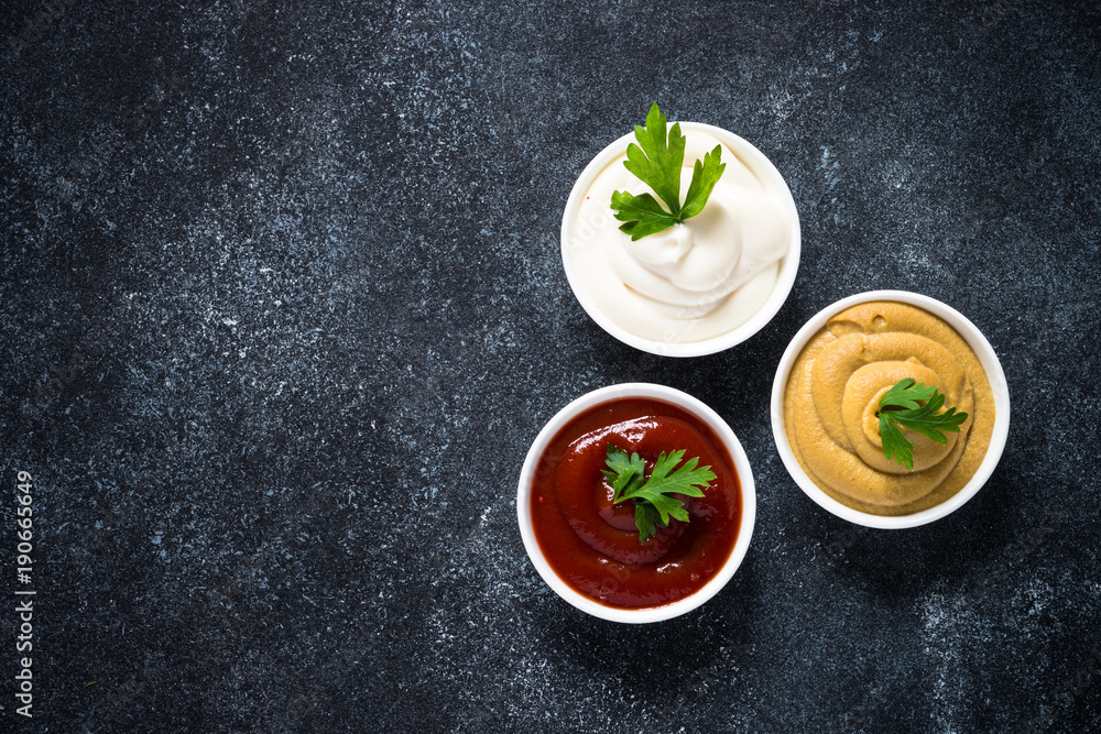 Tree classic sauce - ketchup, mayonnaise and mustard. Top view. Tree classic sauce - ketchup, mayonnaise and mustard. Top view.