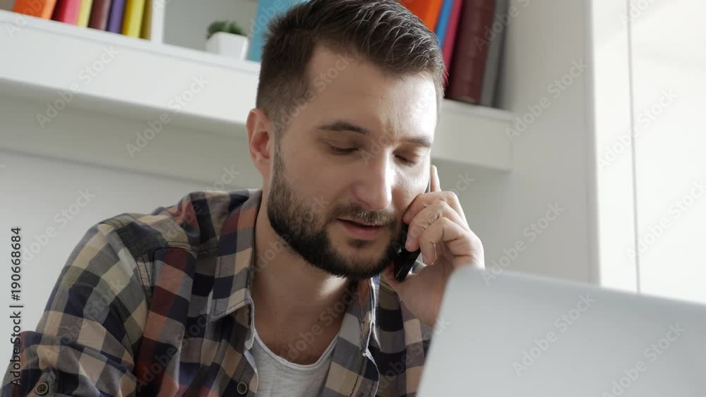 Middle-aged businessman working on the laptop Middle-aged businessman working on the laptop