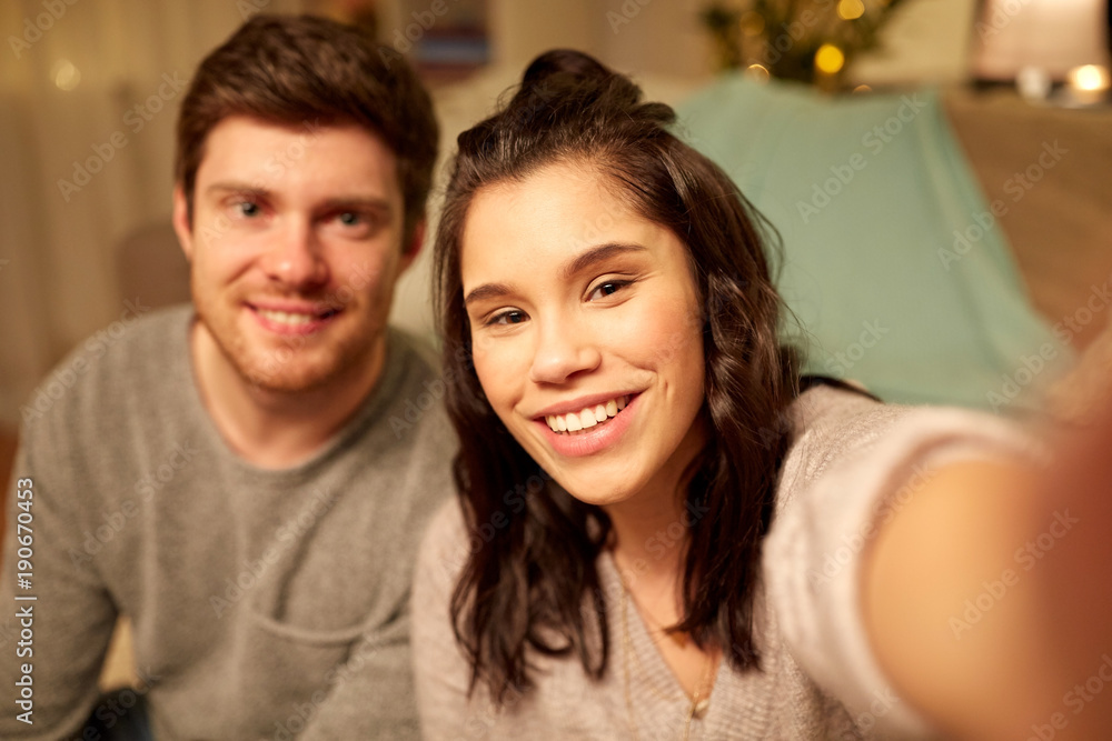 happy couple taking selfie at home happy couple taking selfie at home