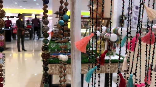 Close up of Market jewelry, bijouterie jewelry beads and bracelets. Bali island. Shopping mall. photo
