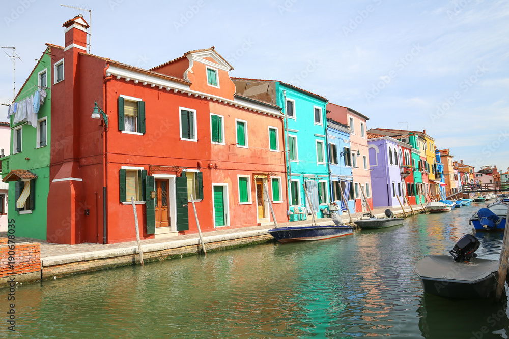 Burano island / waterfront view of the colorful buildings.