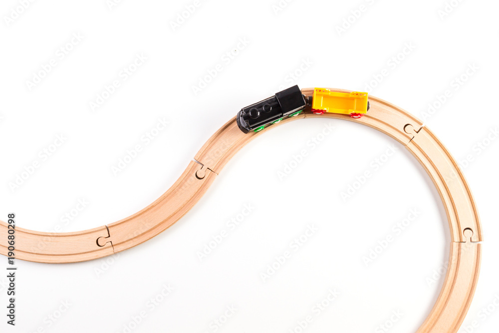 Toy train on curve wooden railways. Top view. Toy train on curve wooden railways. Top view.