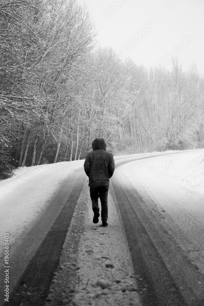 the man who is in the road that is snow the man who is in the road that is snow
