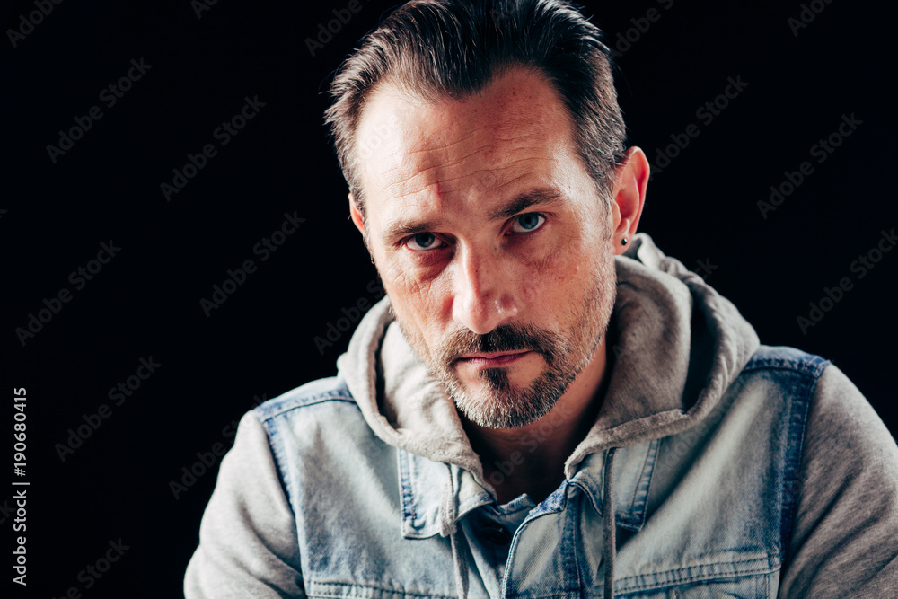 Portrait of young man with isolated look. Having problems with man power. Portrait of young man with isolated look. Having problems with man power.