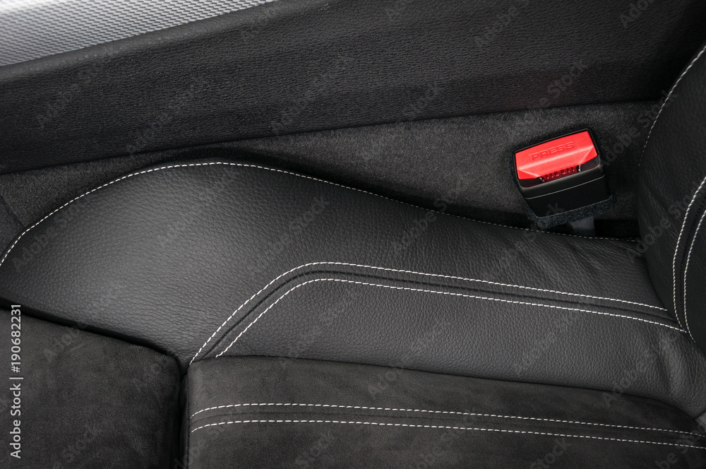 Part of modern car leather seat. Interior detail.