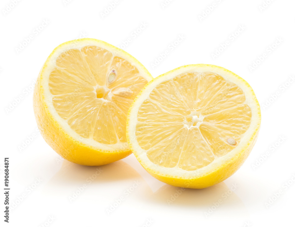 Two lemon halves isolated on white background one yellow lemon cut in half. Two lemon halves isolated on white background one yellow lemon cut in half.