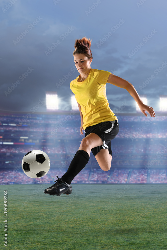Naklejka premium Female Soccer Player in Action
