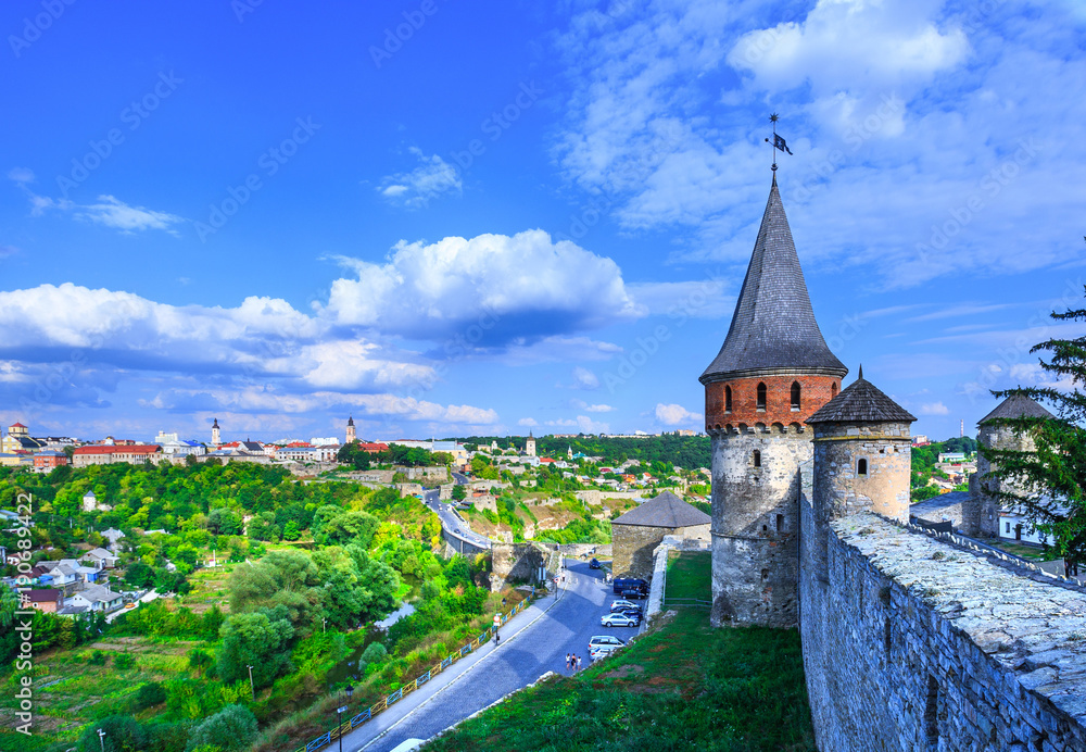 Ancient medieval Kamianets-Podilskyi Castle has rise over the surrounding Smotrych River canyon. Khmelnytskyi region. Ukraine