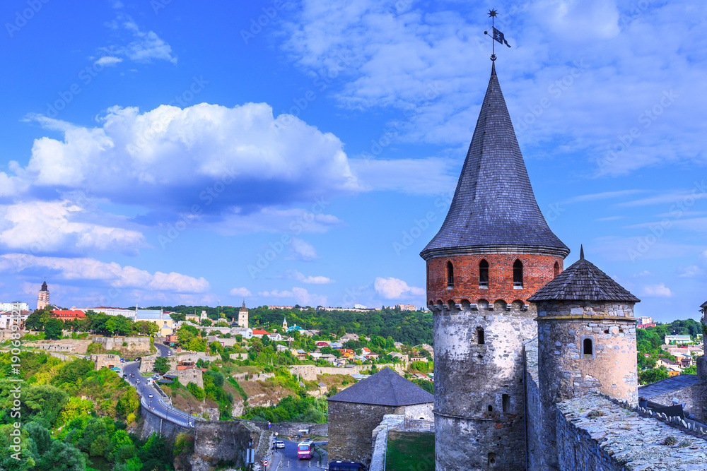 Ancient medieval Kamianets-Podilskyi Castle has rise over the surrounding Smotrych River canyon. Khmelnytskyi region. Ukraine