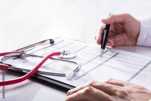 Close-up Of A Stethoscope On White Desk