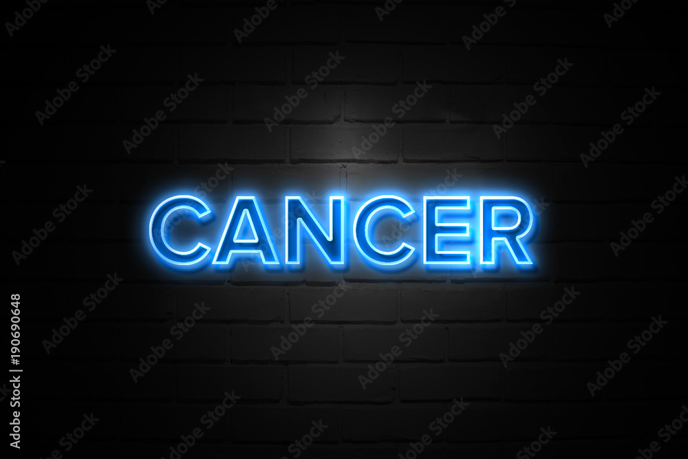 Cancer neon Sign on brickwall