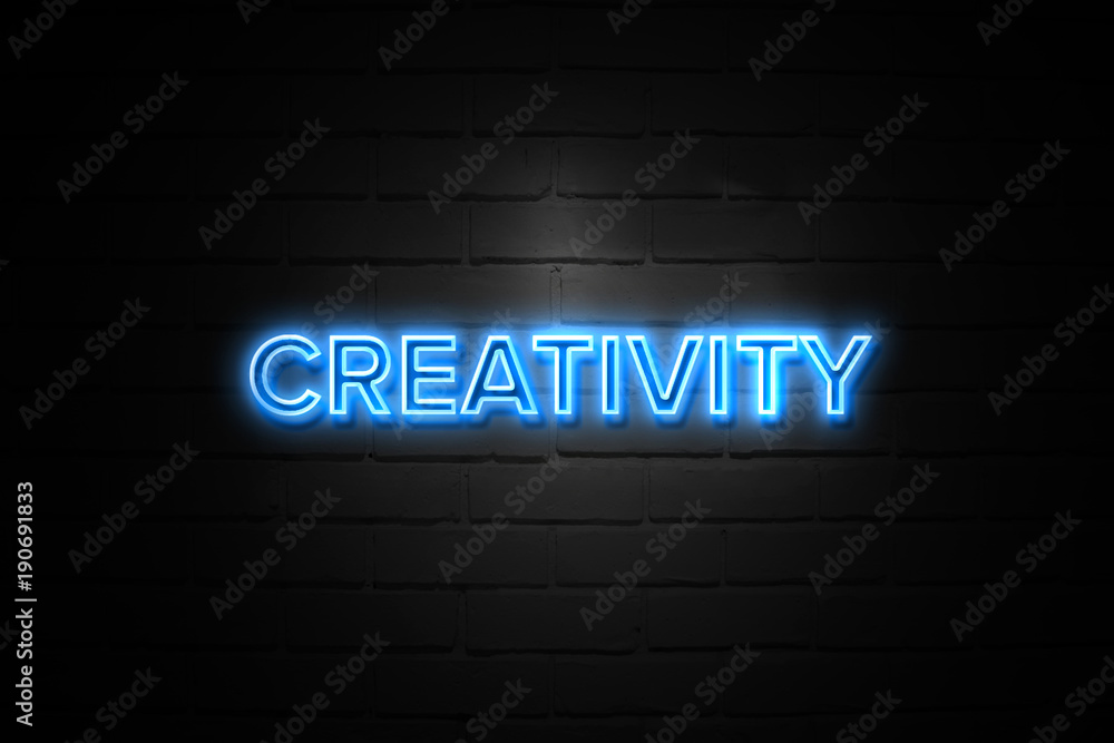 Creativity neon Sign on brickwall - obrazy, fototapety, plakaty 