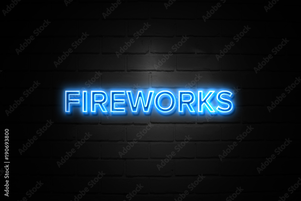 Fireworks neon Sign on brickwall Fireworks neon Sign on brickwall