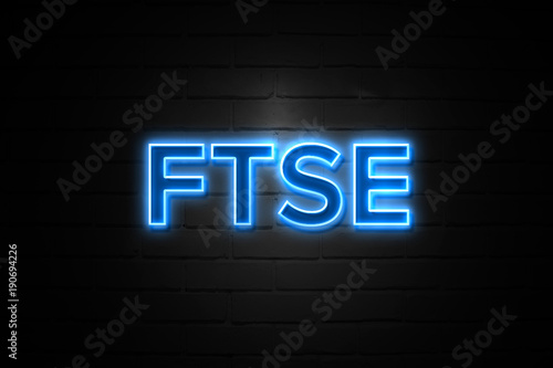 Ftse neon Sign on brickwall